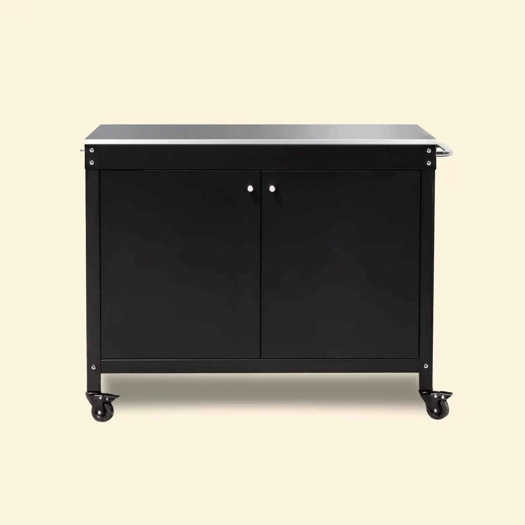 Desserte Bodega noire pour plancha Vivaplancha, plateau en inox, deux portes et roulettes, sur fond beige.