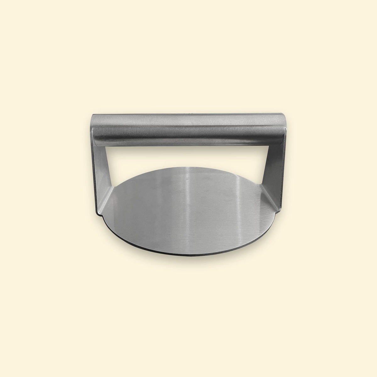 Presse à smash burger en inox vue de face, avec une poignée cylindrique et une base ronde plate.